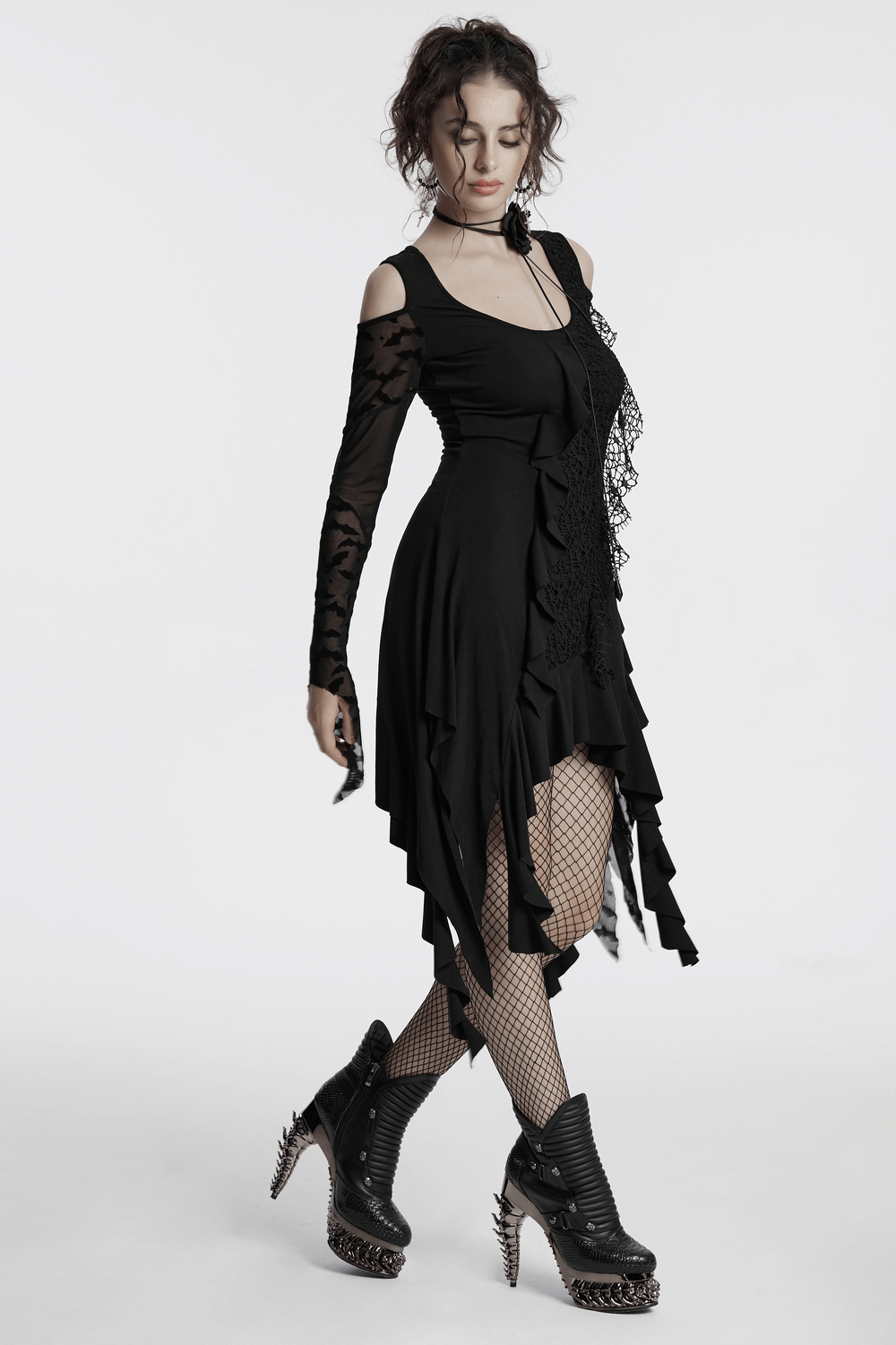 Gothic black bat mesh dress with ruffled hem and sleeves, flaunting an edgy design and exposed shoulders.