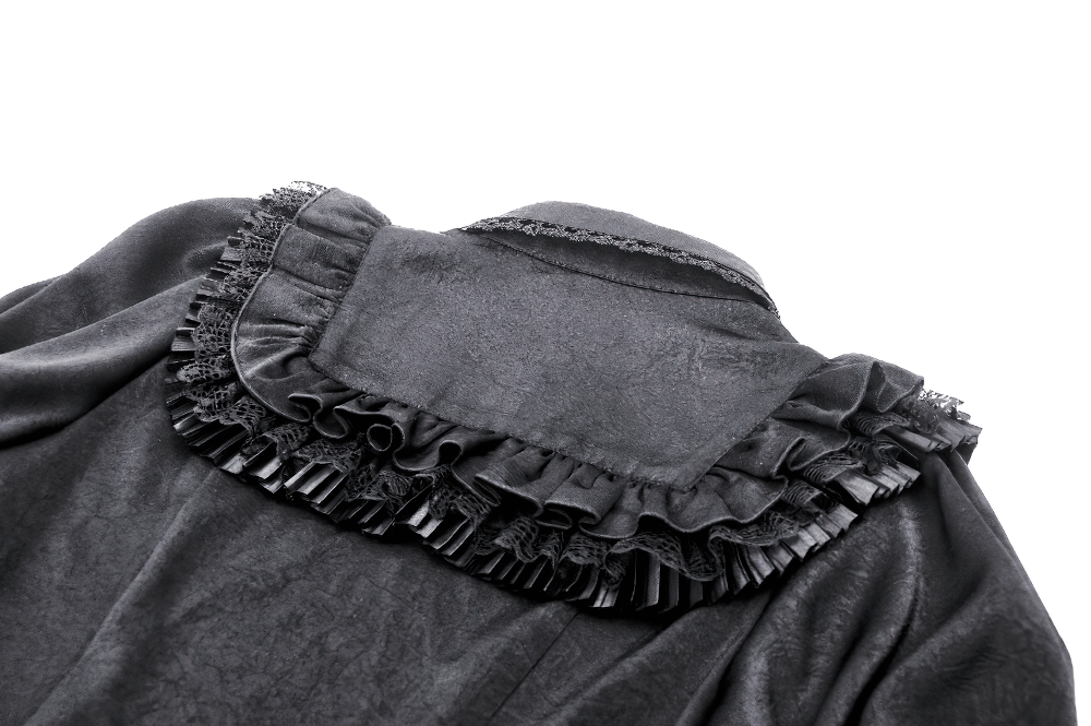 Detailed view of the ruffled collar on a Victorian-inspired black blouse with elegant design.