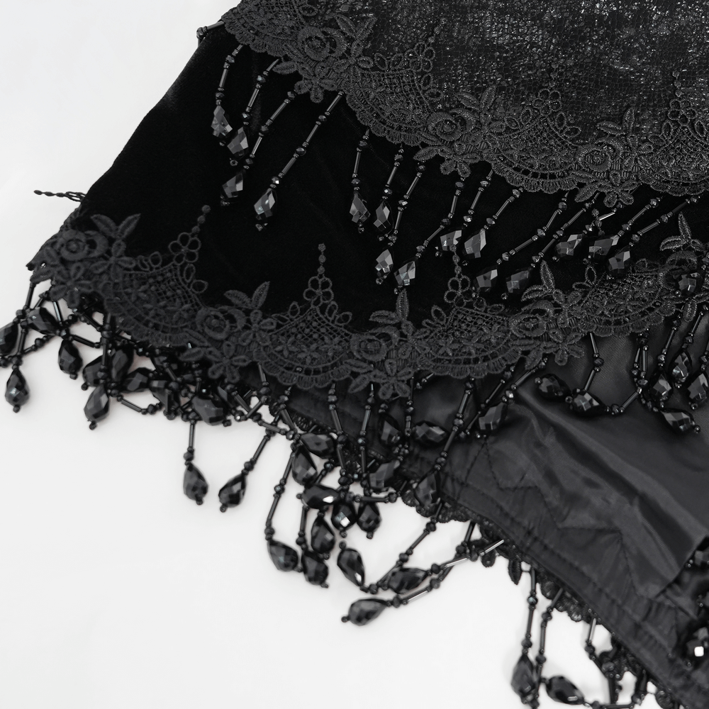 Elegant black lace and bead trim from a Gothic bolero shrug, perfect for adding a dramatic touch to outfits.