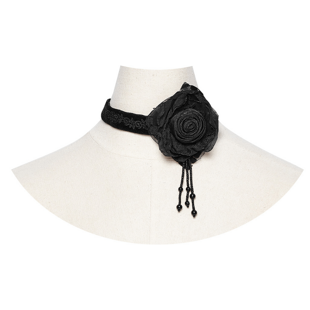 Gothic black burning rose choker with bead chains and lace, showcasing vintage elegance and bold style.