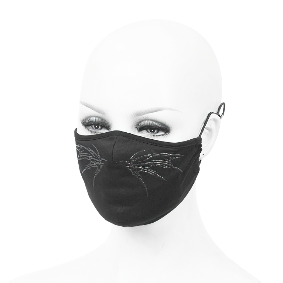 Gothic black butterfly face mask on mannequin, featuring adjustable bands and stylish wing design for unisex gothic fashion.