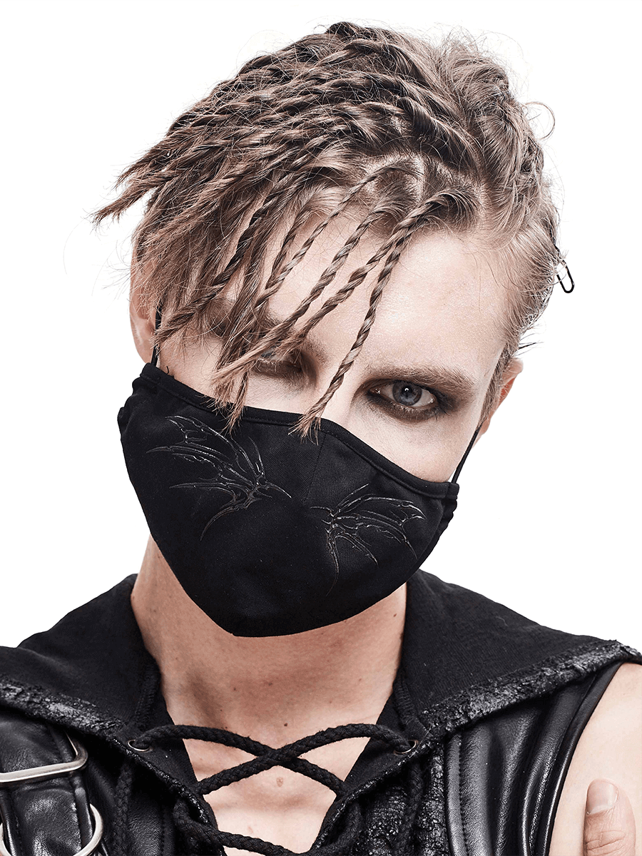 Gothic black butterfly face mask worn by model with unique hairstyle, perfect for unisex gothic fashion.