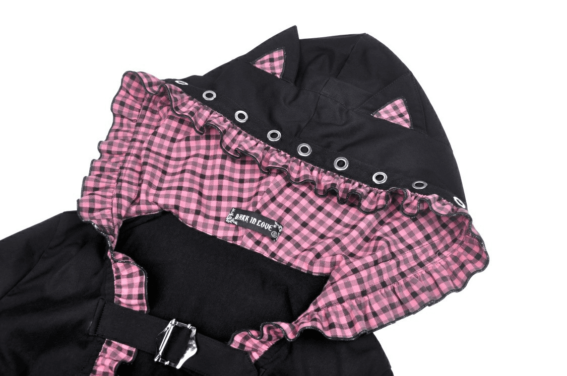 Gothic black cat ear crop top with pink plaid hood close-up, showcasing ruffled details and stylish design.