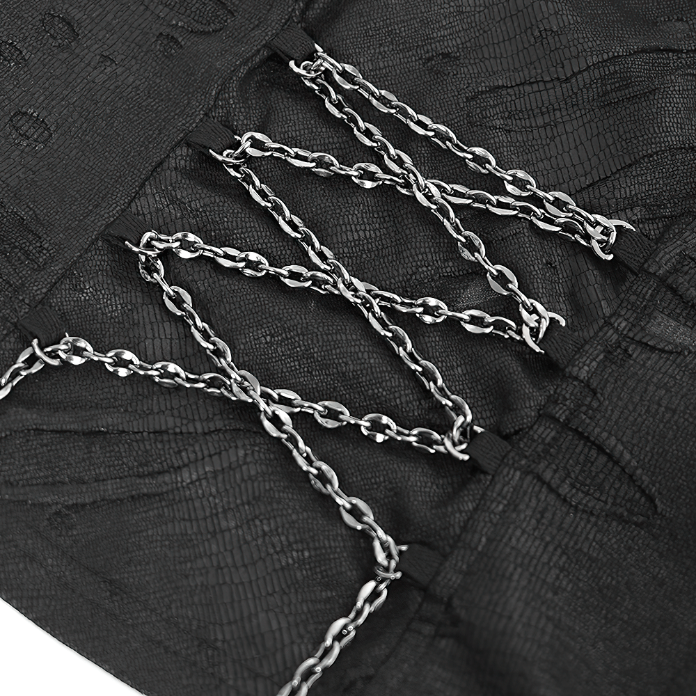 Close-up of gothic black halter top featuring chain embellishments and lace-up design, showcasing the edgy details.