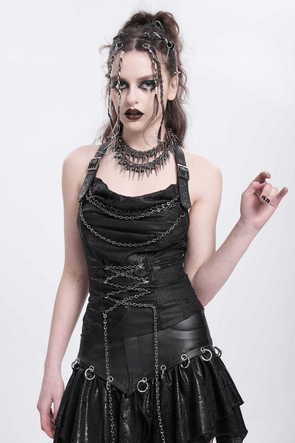 Gothic black halter top with chains, lace-up design, and adjustable straps, styled for alternative fashion.