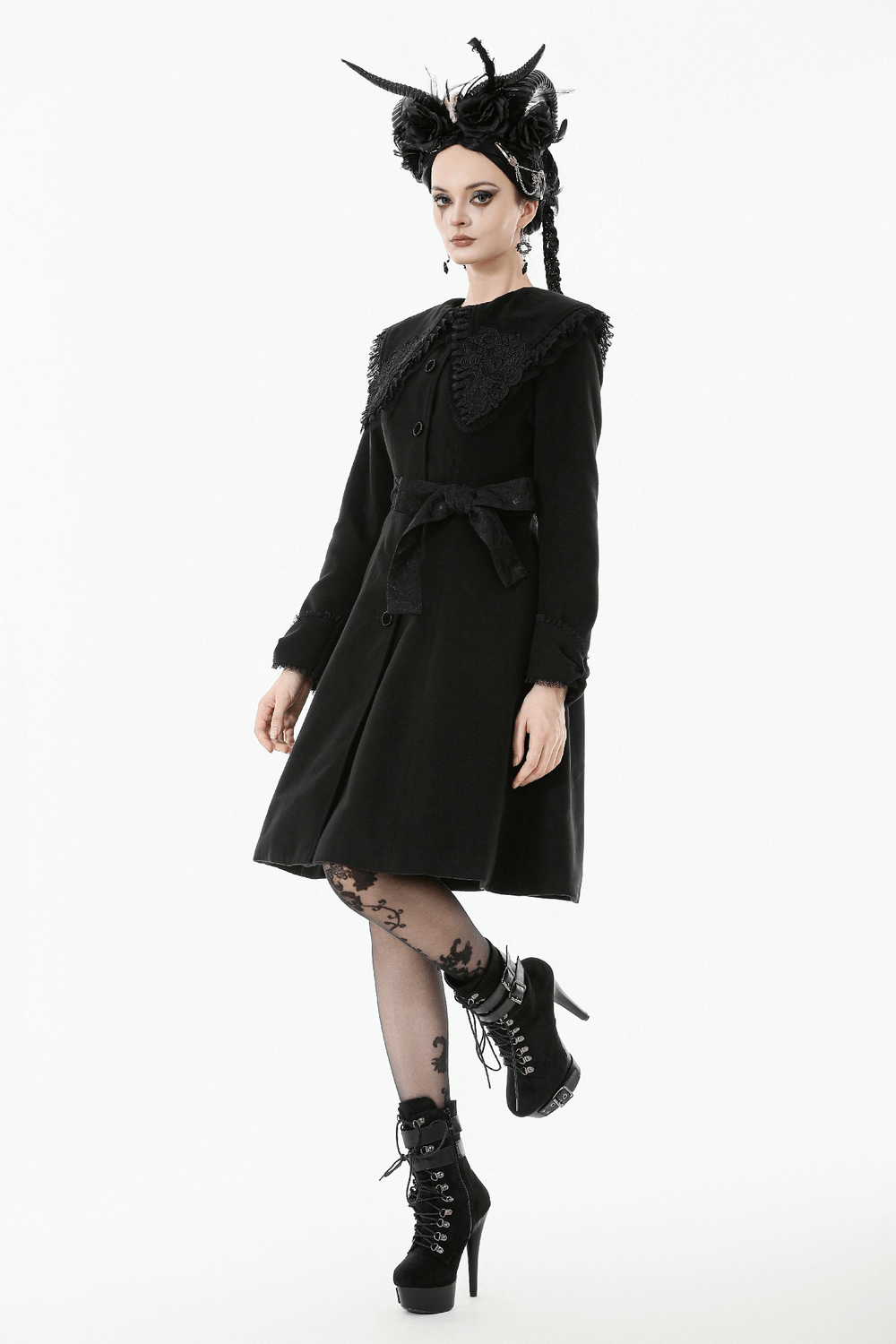 Gothic Black Coat with Lace Collar and Bow Detail worn by model with stylish accessories and elegant silhouette.