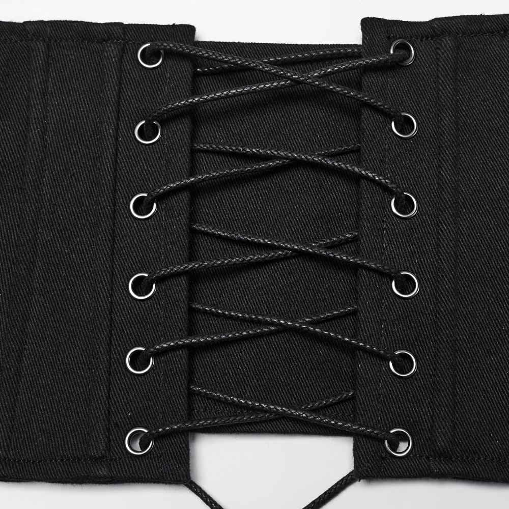 Close-up view of gothic black corset belt with lace-up back and eyelets for adjustable fit.