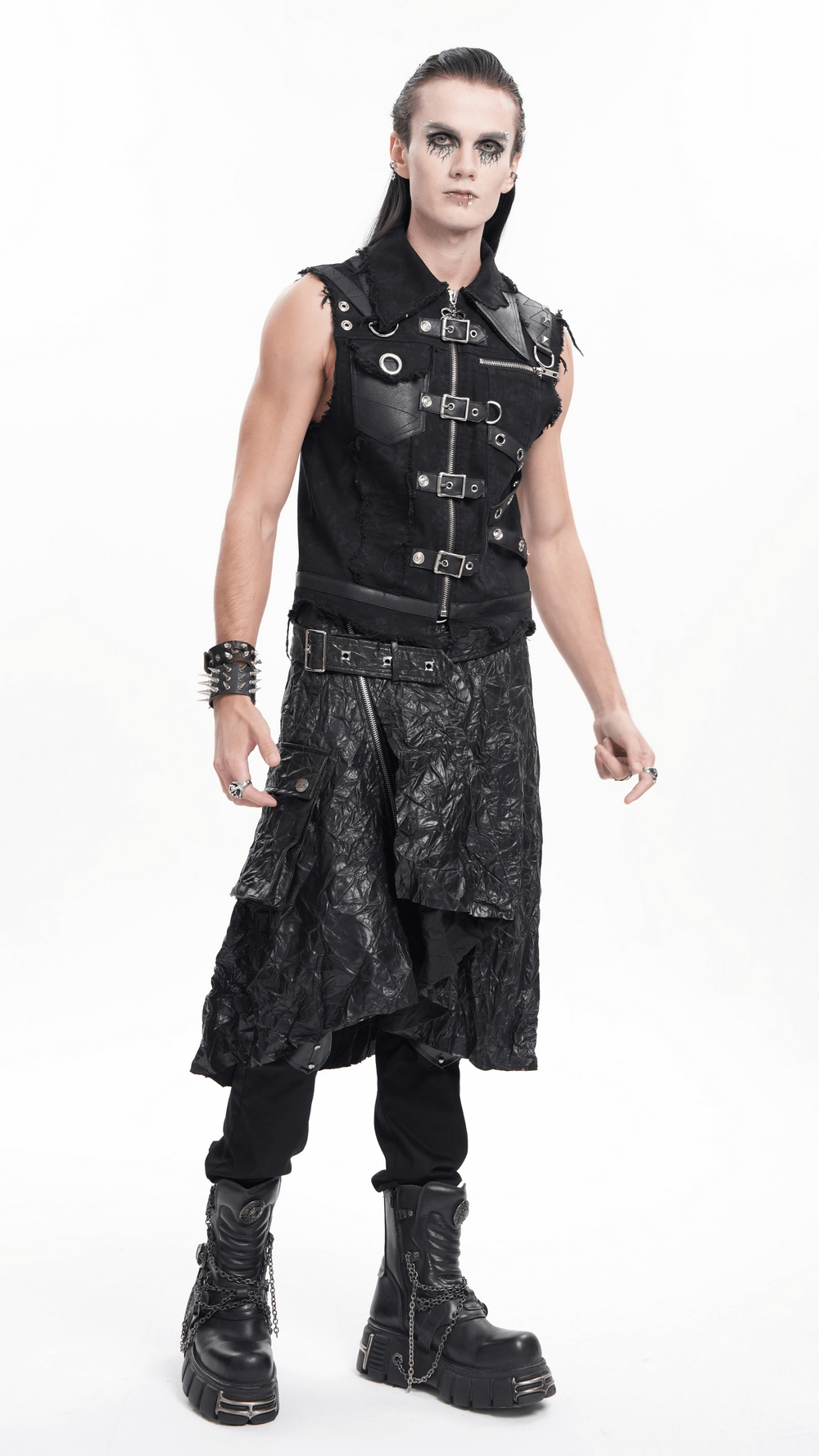 Model showcasing a gothic black crinkled leather kilt with buckles, paired with a punk rock vest and boots.