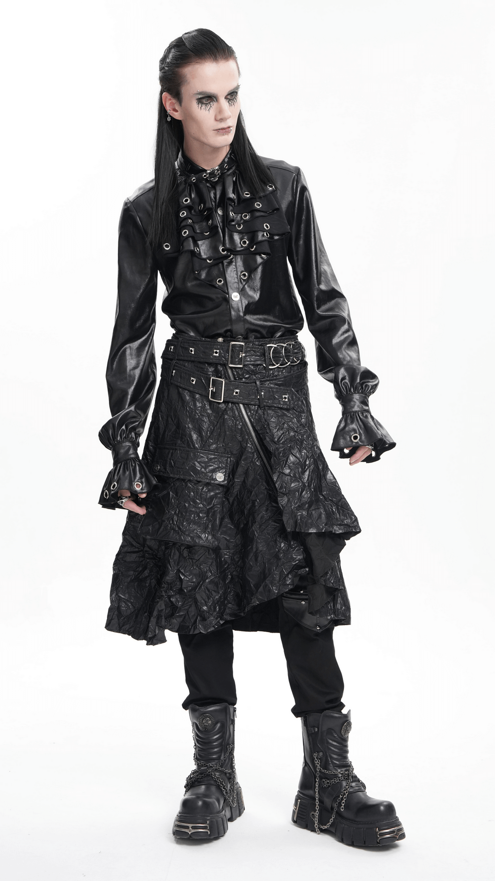 Model showcasing a Gothic black crinkled leather kilt with buckles, zipper, and textured design, perfect for punk rock fashion.