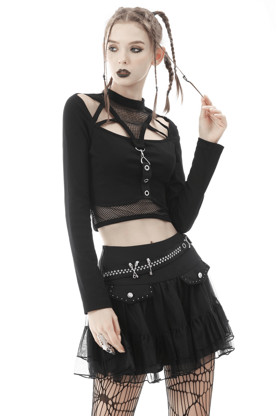 Gothic black crop top with fishnet sleeves, straps, and edgy detailing paired with a stylish black skirt.