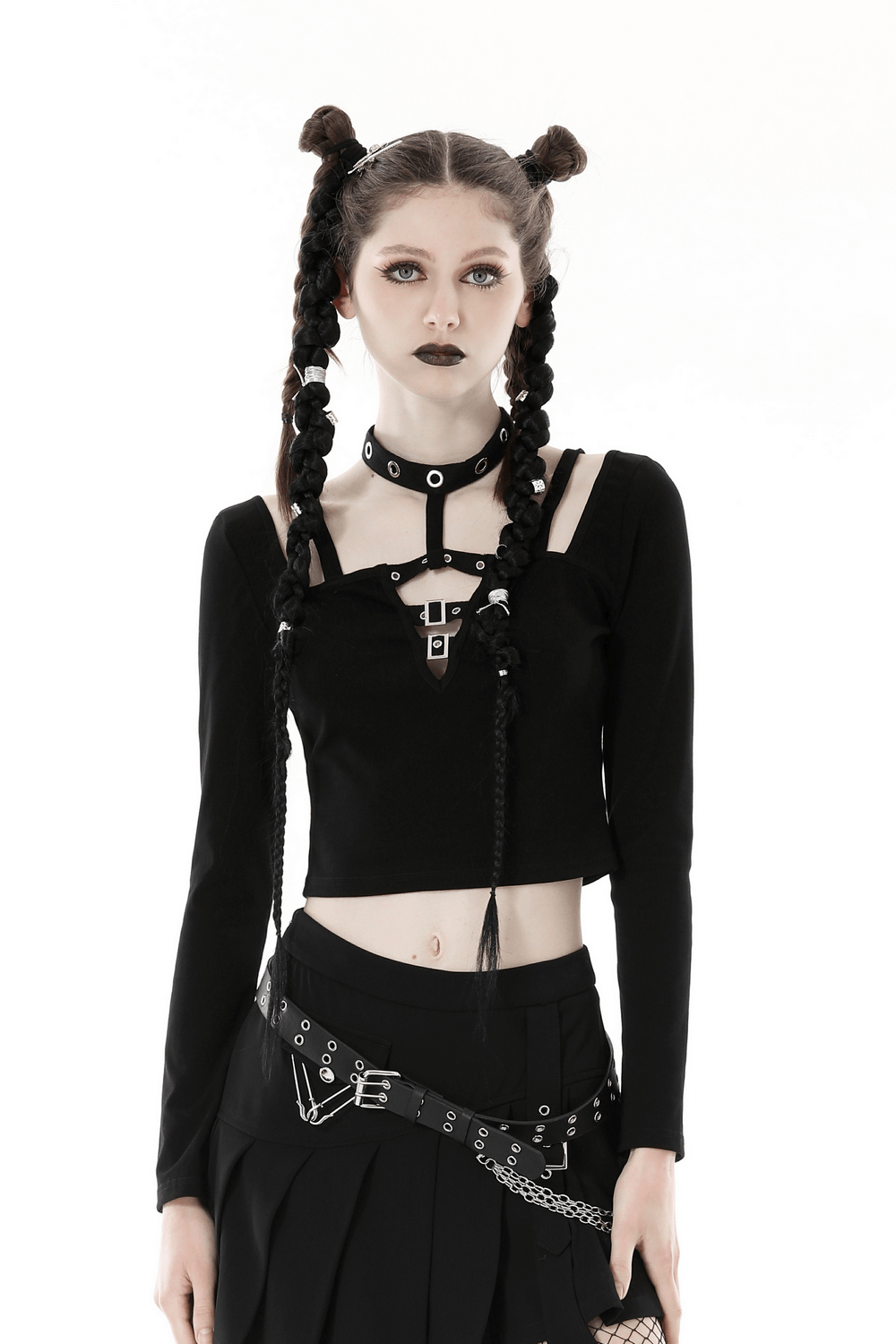 Gothic black crop top with metal accents, harness detailing, and long sleeves, perfect for edgy dark fashion.