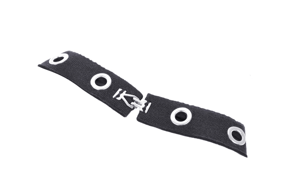 Gothic black harness band with silver metal accents and eyelets for edgy dark fashion styles.