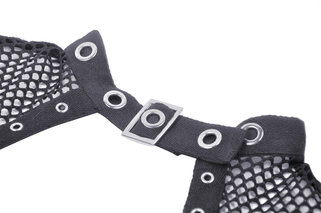 Close-up of gothic black dress's fishnet detail and lace-up closure with rivet accents, showcasing edgy fashion style.