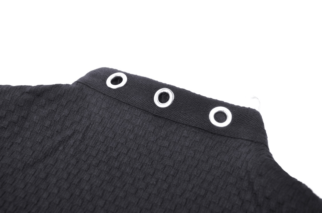 Close-up of black dress collar featuring rivet accents and eyelets for a gothic touch.