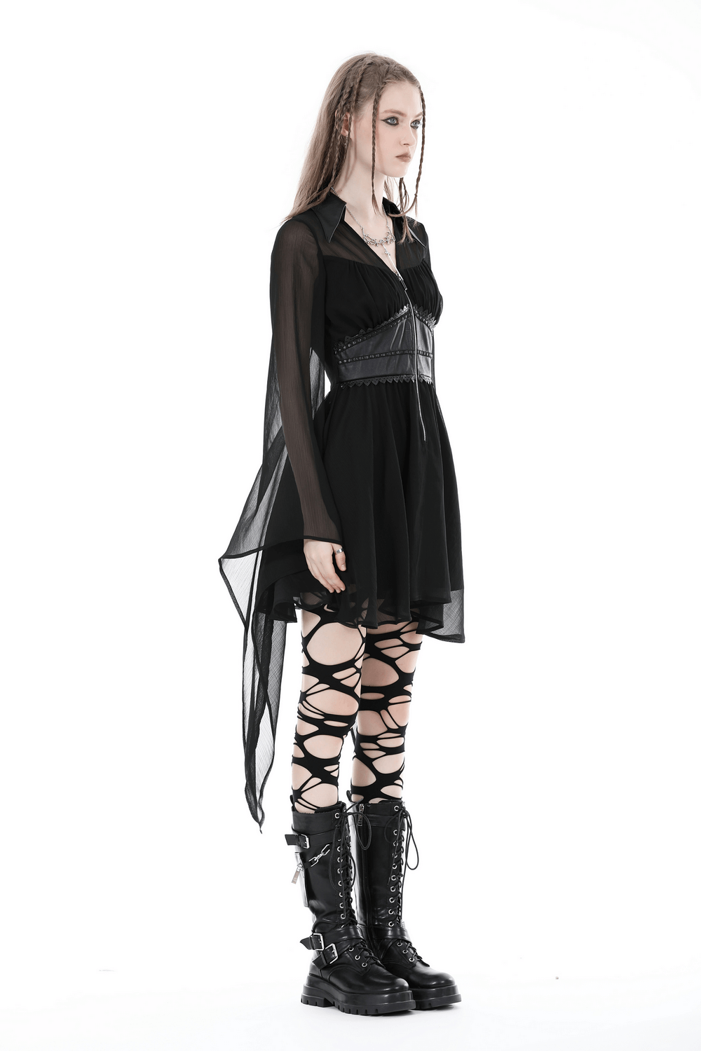 Gothic black dress with lace-up detail, flowy sleeves, and edgy lace-up boots for dark fashion enthusiasts.