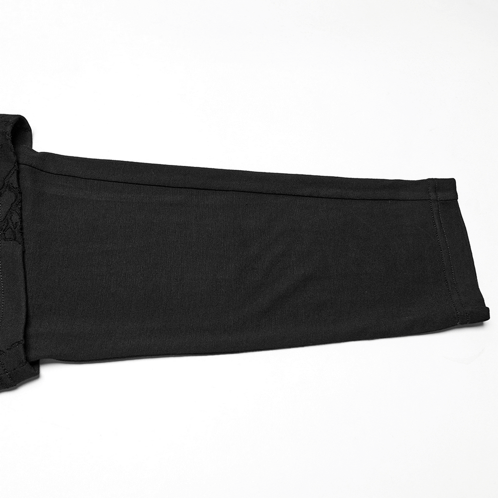 Black drop crotch pants showcasing relaxed fit and smooth texture, perfect for punk style enthusiasts.