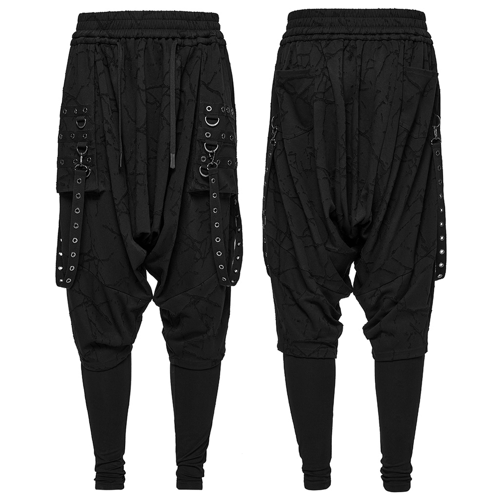 Gothic black drop crotch pants with eyelet straps and bold pockets, perfect for punk-inspired style.