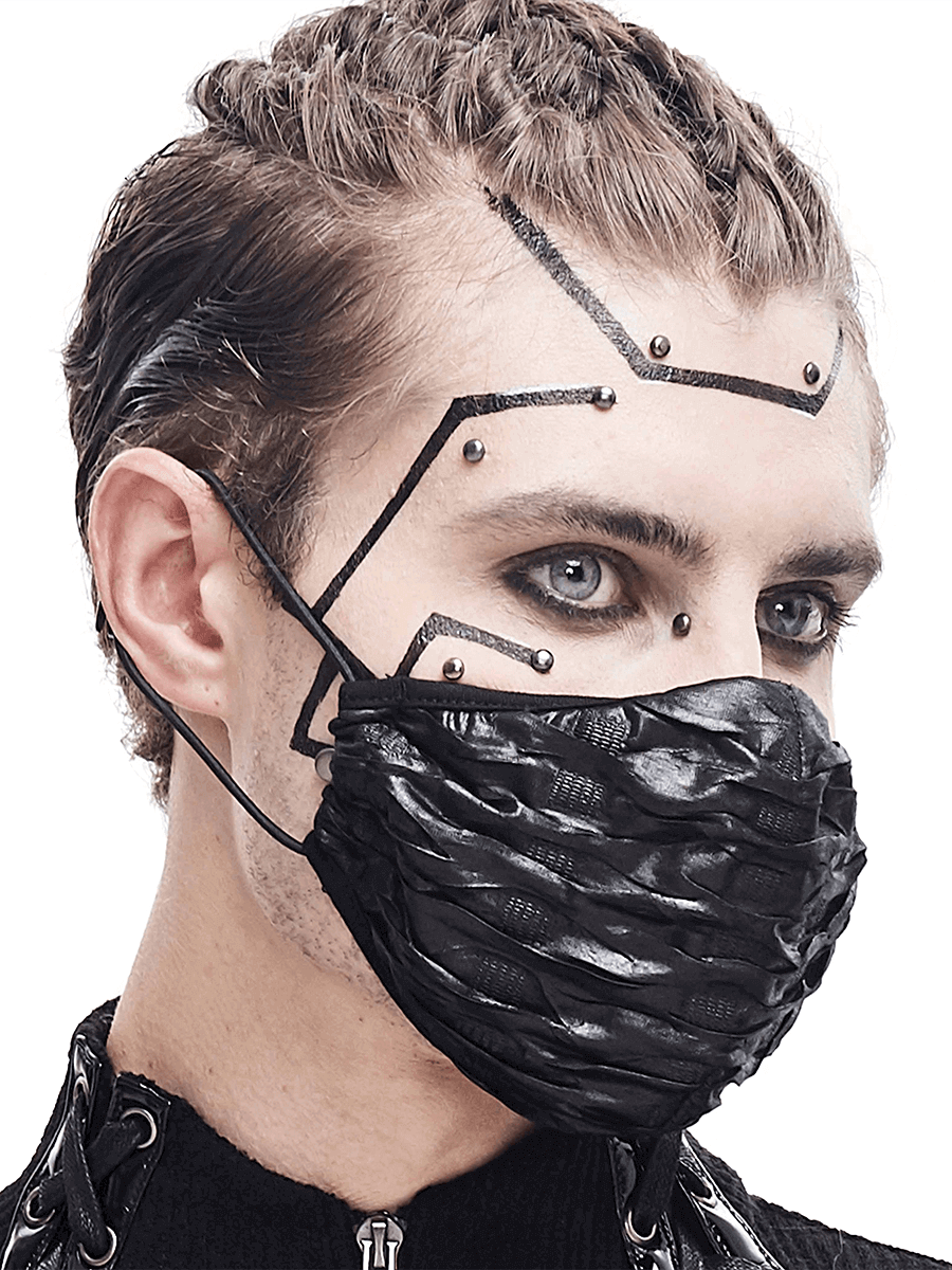 Gothic black face mask with wrinkled effect, worn by model with cyberpunk hairstyle and makeup.