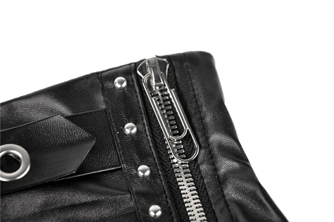 Close-up of gothic black faux leather skirt's zip detail and double grommet belts for a punk aesthetic.