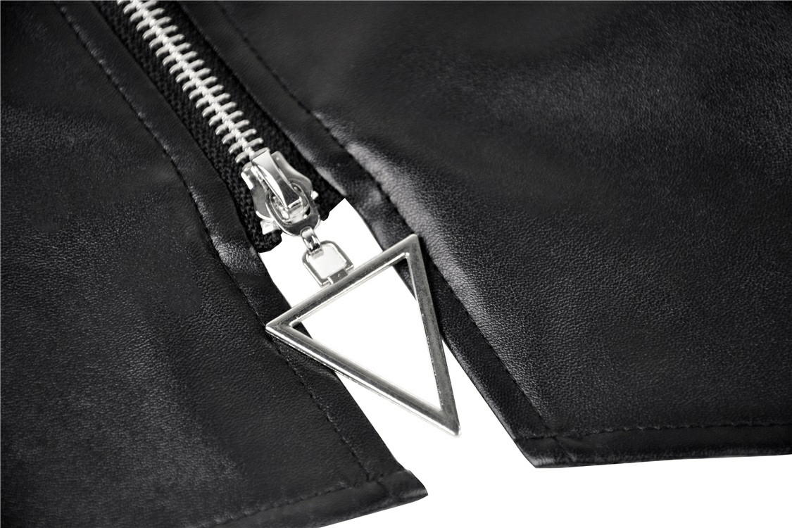 Close-up of black faux leather skirt zipper with triangle pendant detail, showcasing edgy punk style.