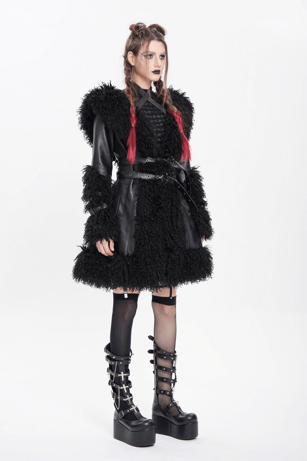 Gothic black faux leather hooded coat with faux fur trim, belted waist, worn by model in edgy punk style.