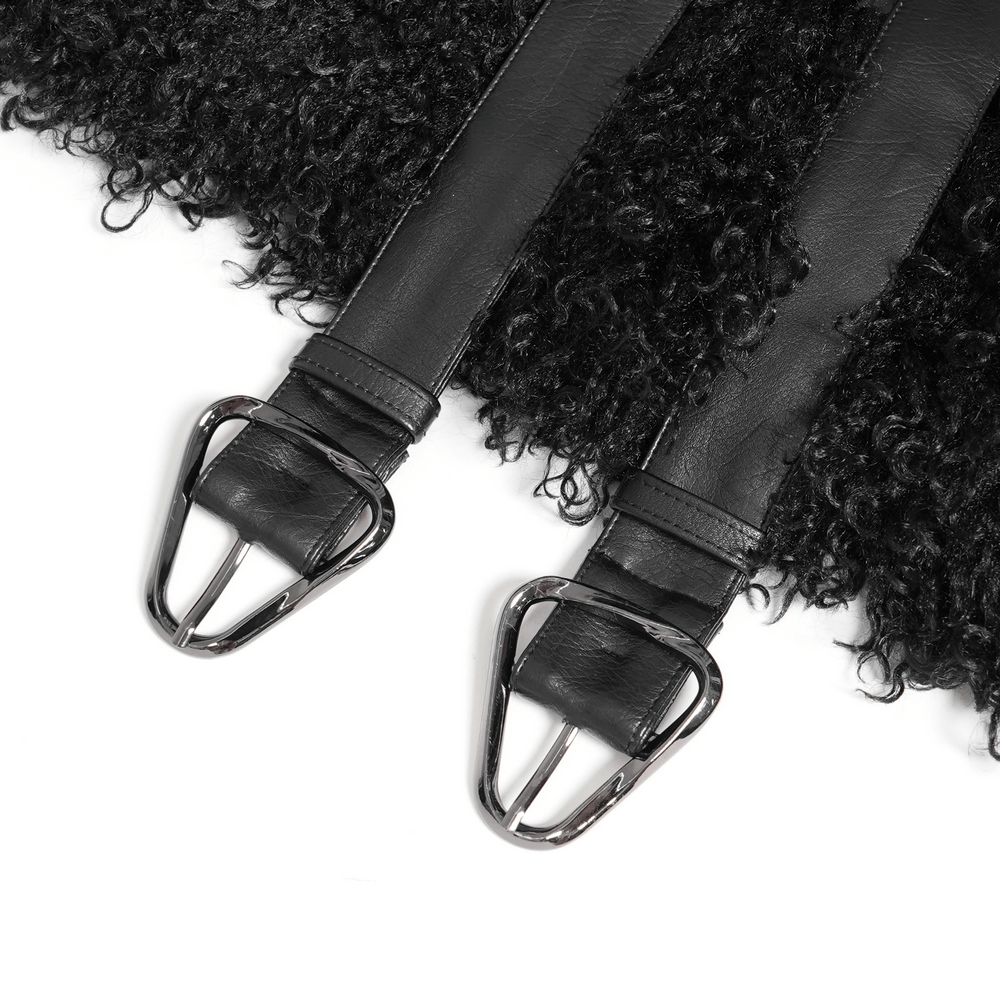 Close-up of textured black faux fur and leather straps with metal buckles on a gothic-style coat.