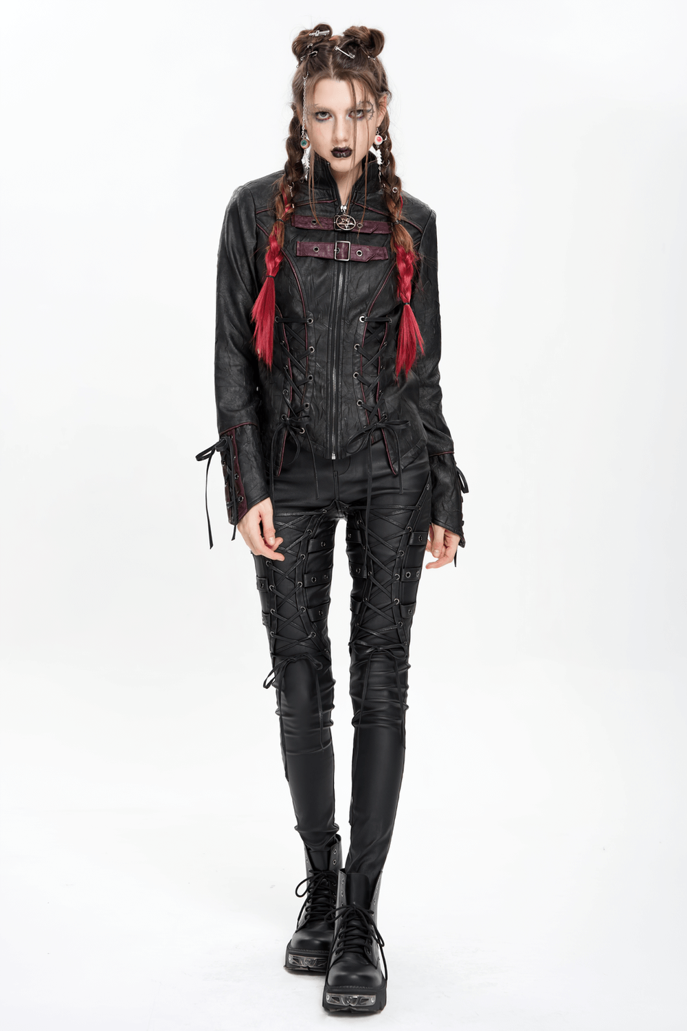 Gothic black faux leather jacket with buckles and lacing, paired with high-waisted lace-up pants for a punk look.