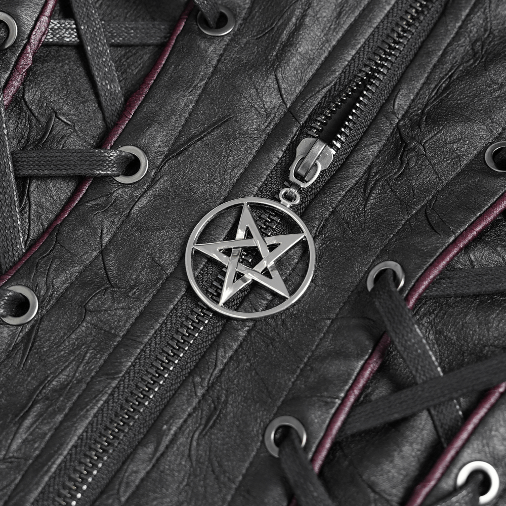 Close-up of pentagram zipper pull on gothic black faux leather jacket with lace-up details.