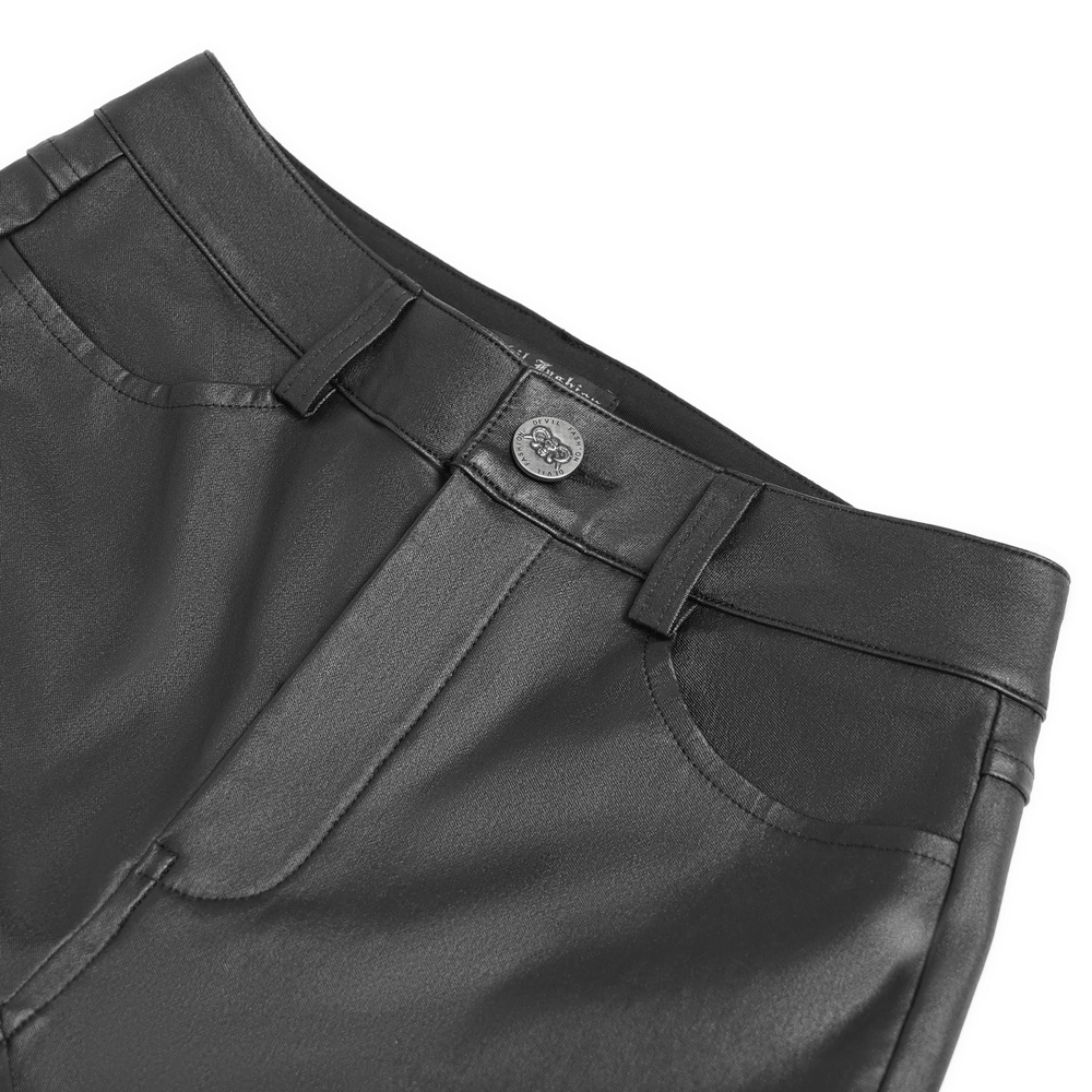 Close-up of gothic black faux leather pants showcasing sleek texture and high-waisted design with pockets.