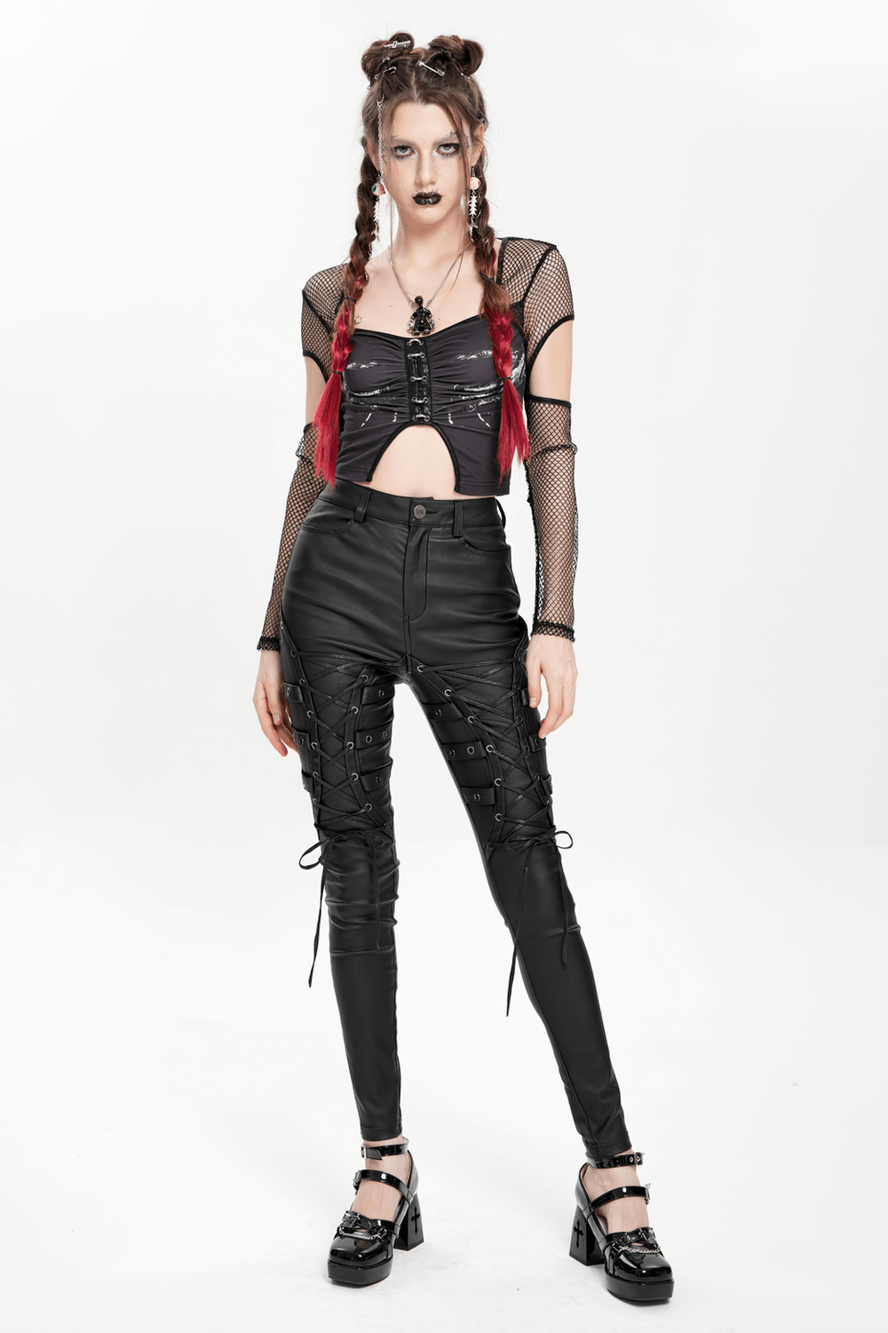 Gothic black faux leather pants with lace-up straps, perfect for punk rock style and edgy nightlife fashion.