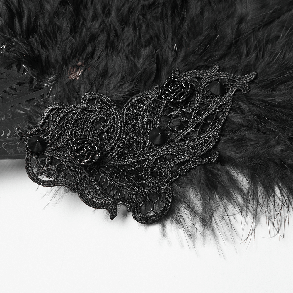 Gothic Black Feather Fan with Tassel and Cross Pendant close-up of intricate lace and floral detailing on black feathers.