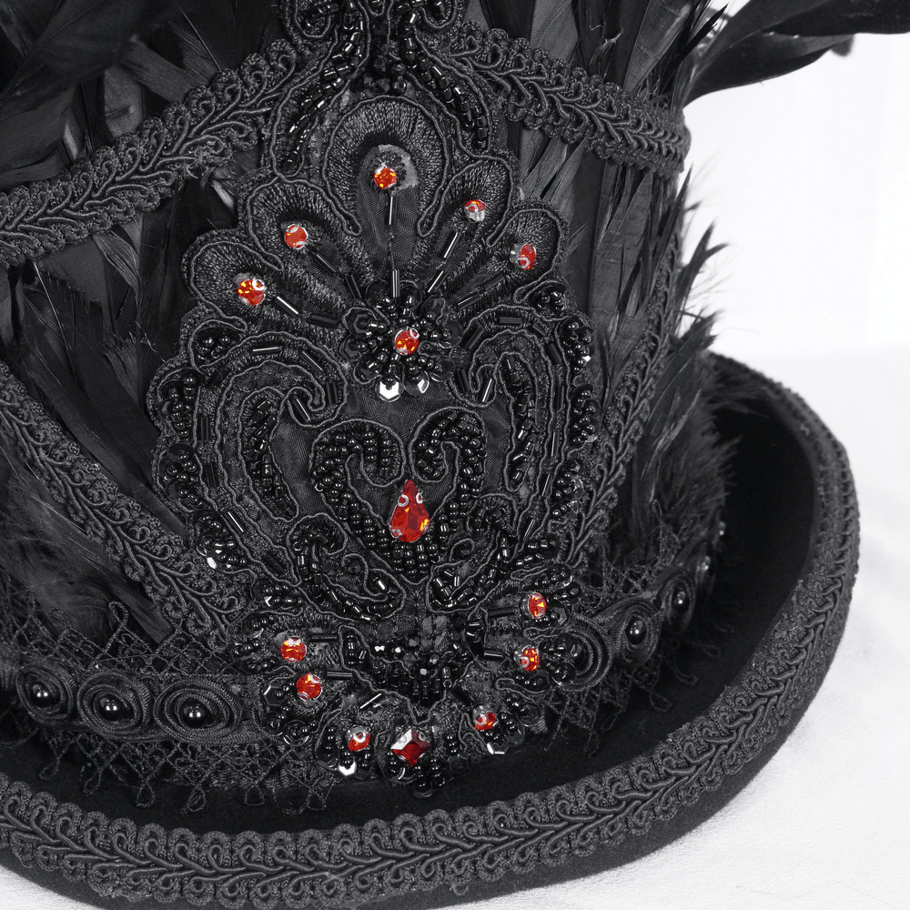 Elegant gothic black feathered top hat with red jewel accents and intricate embroidery details.