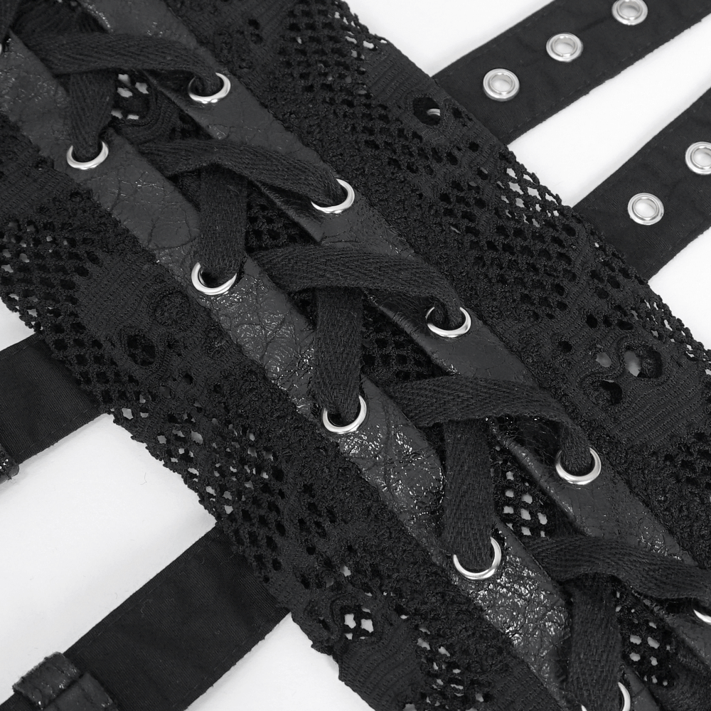 Close-up of gothic black fishnet fingerless gloves with buckles and lace detailing, perfect for punk rock outfits.