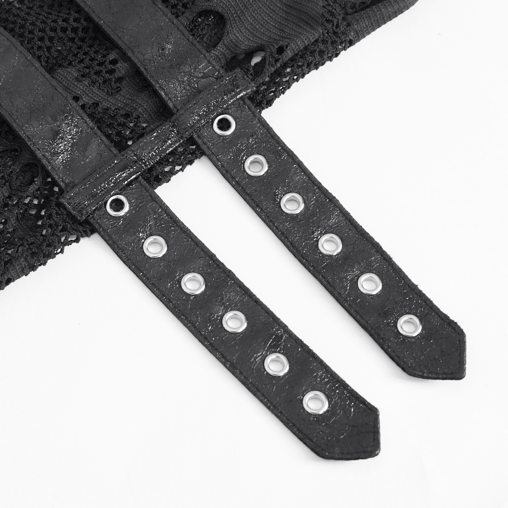 Close-up of buckles on Gothic black fishnet fingerless gloves, showcasing punk rock style and edgy design.