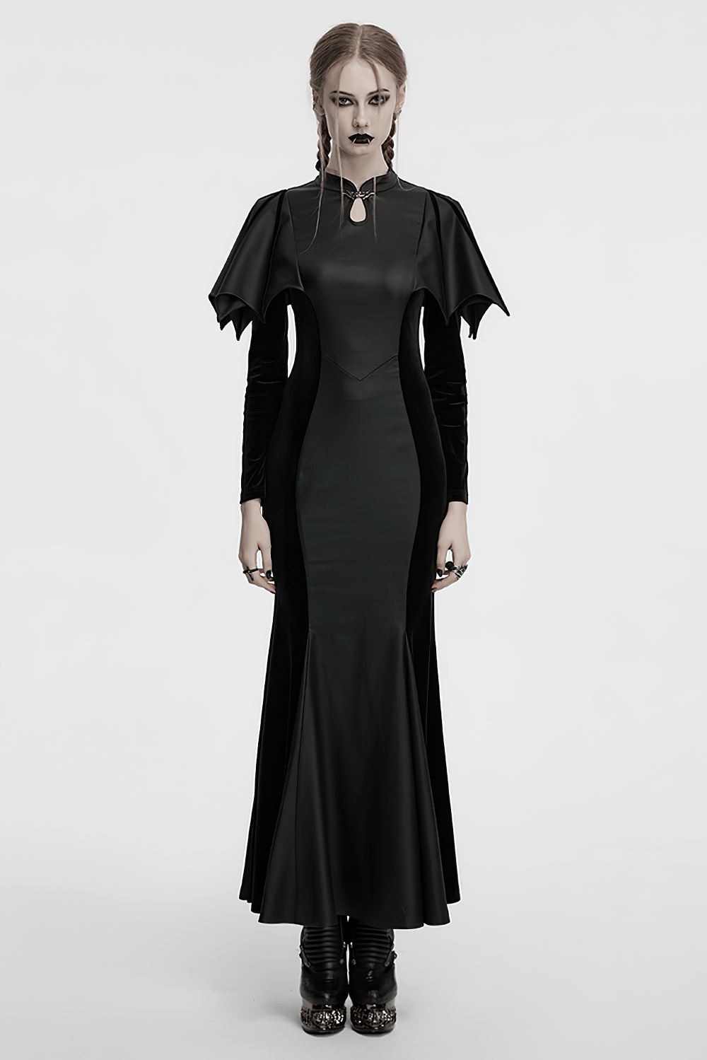 Gothic black fishtail dress with bat shoulders, featuring a keyhole collar and elegant silhouette.