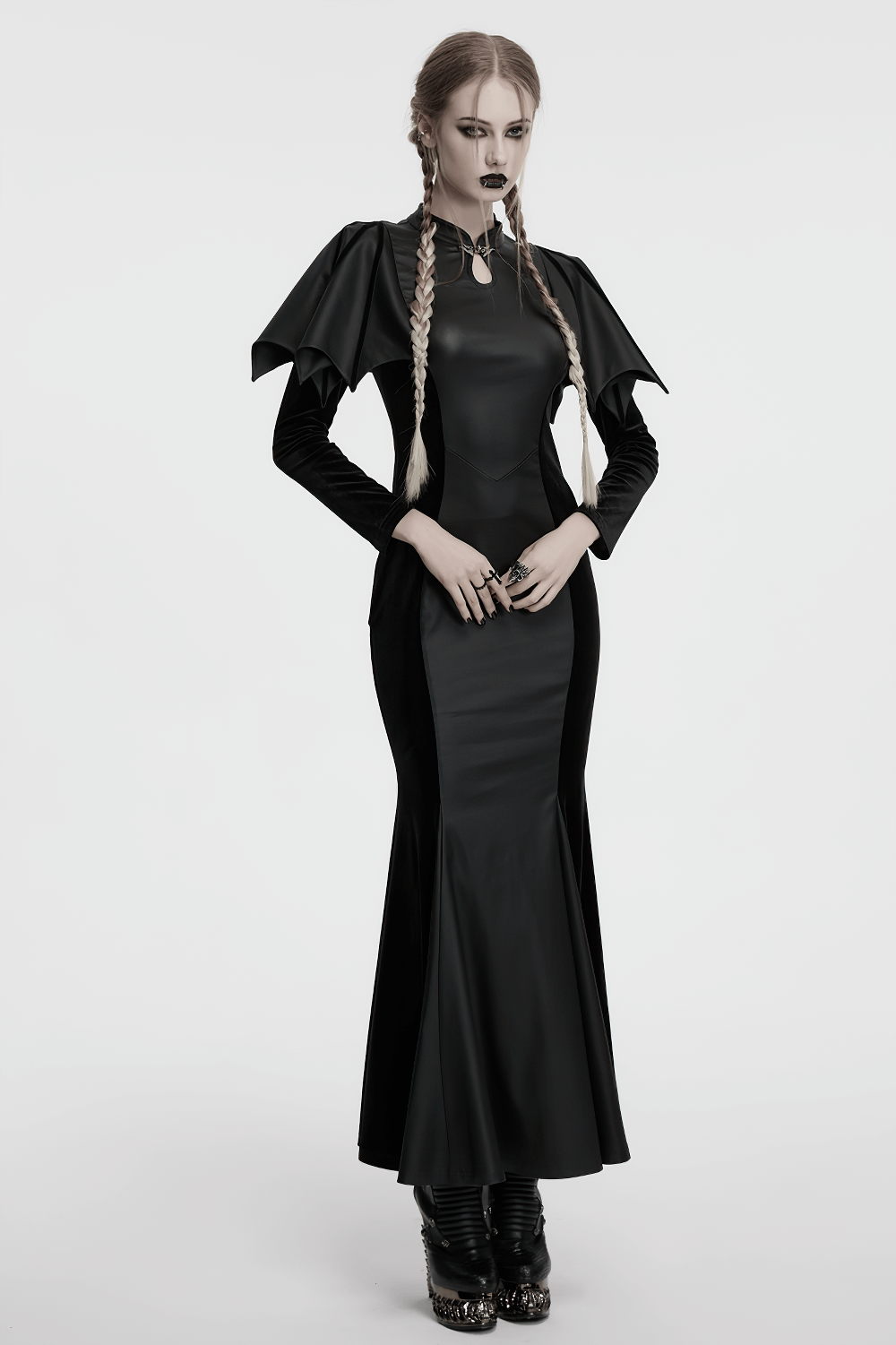 Gothic black fishtail dress with bat shoulders, keyhole collar, and elegant silhouette, perfect for a dark, witchy look.