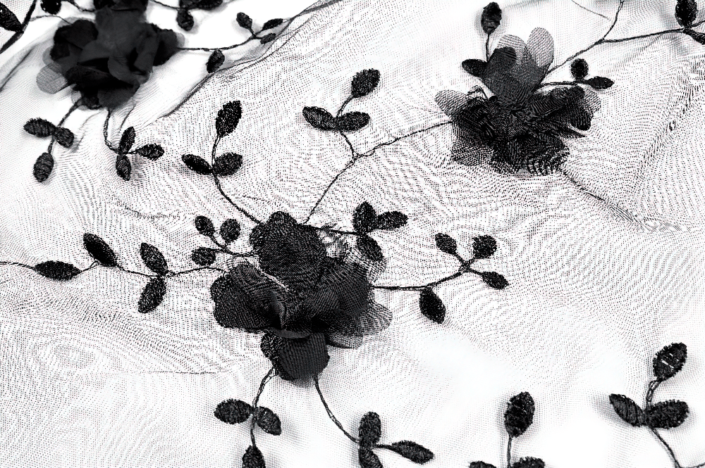 Gothic Black Floral Lace Maxi Skirt for Women detailed fabric with black floral lace embellishments and sheer mesh design.