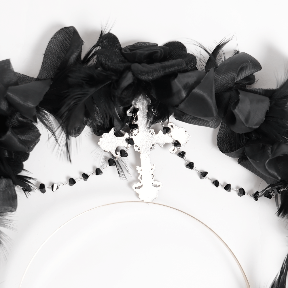 Gothic black halo crown with feathers, cross and rose decor, perfect for alternative fashion and festivals.