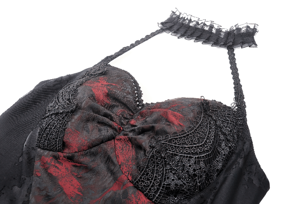 Gothic black halter dress showcasing lace accents and ruffle details, perfect for dark fashion enthusiasts.
