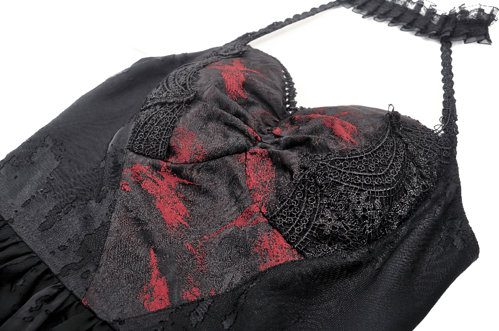 Gothic black halter dress with lace and ruffle details, featuring red accents for a vintage dark fashion look.