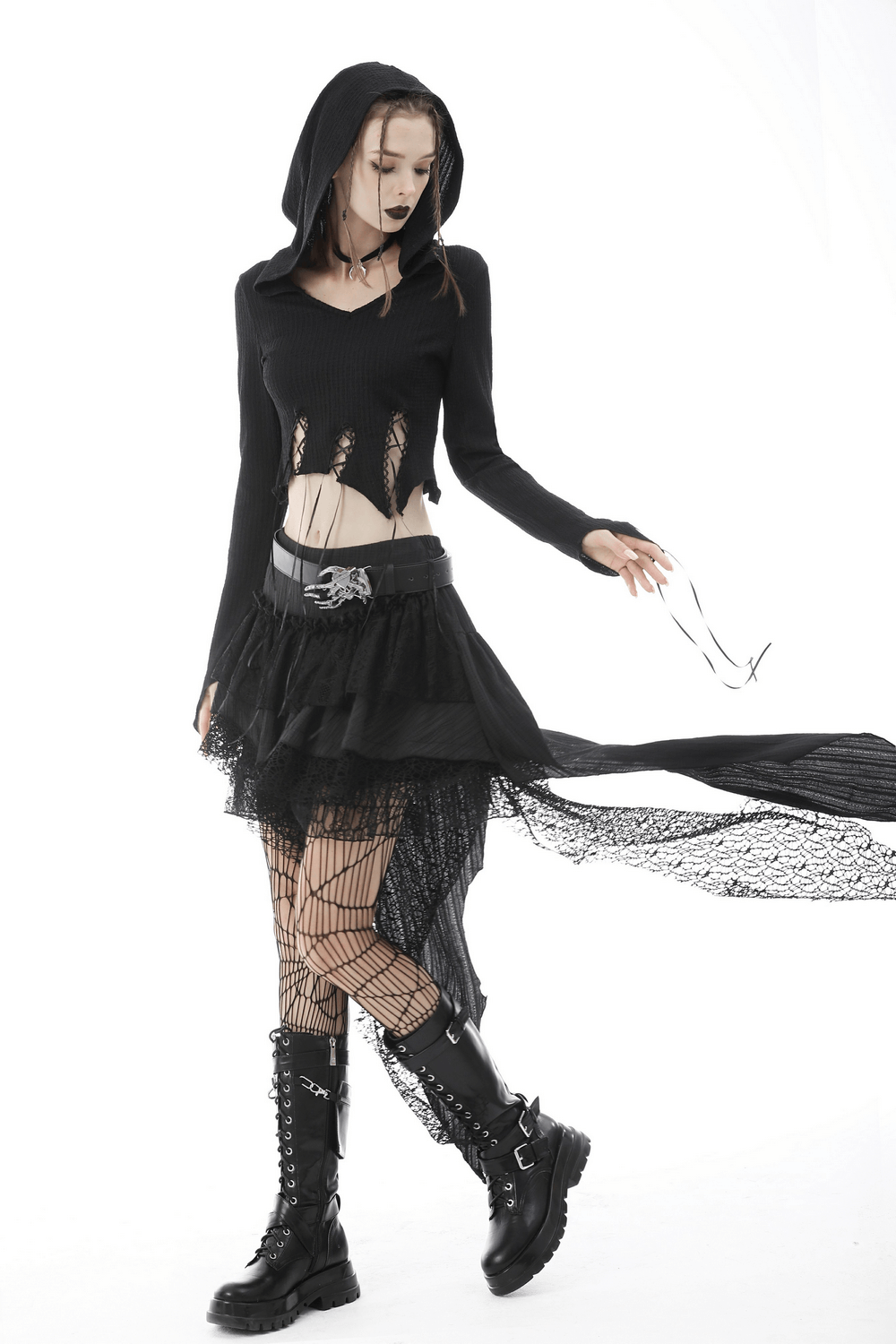 Gothic black hooded crop top with lace detailing, paired with layered black skirt and bold ankle boots for an edgy look.