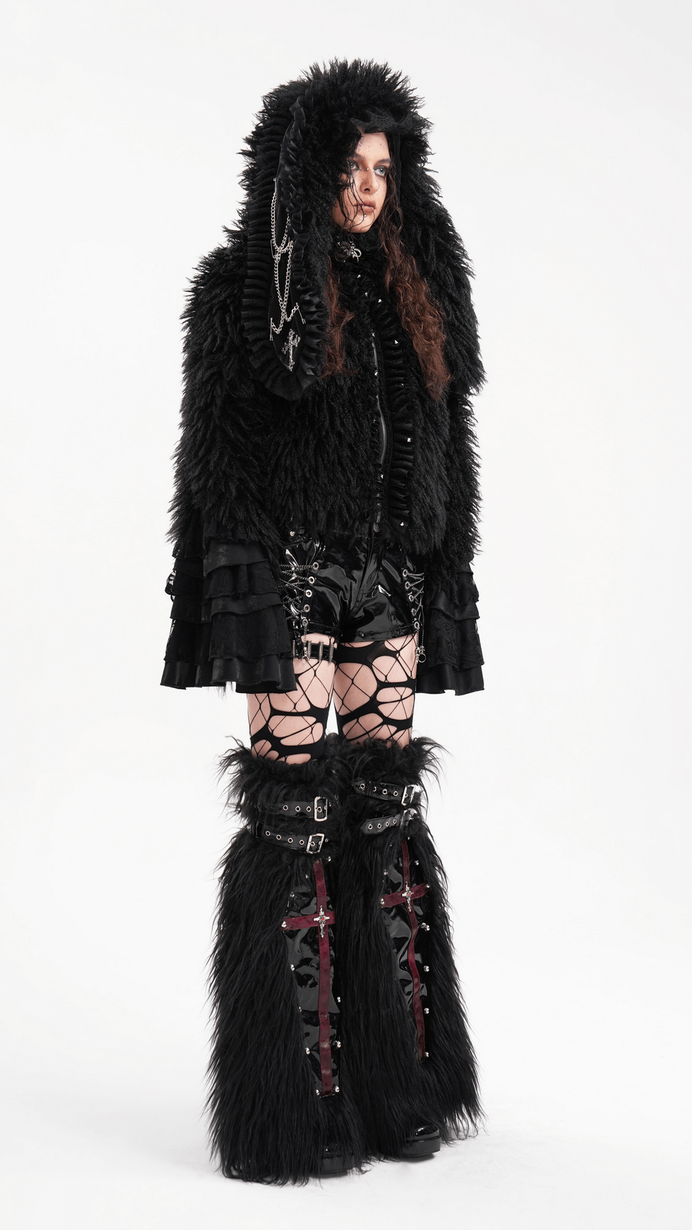 Gothic black hooded jacket with faux fur and lace, styled for dramatic alternative fashion looks.