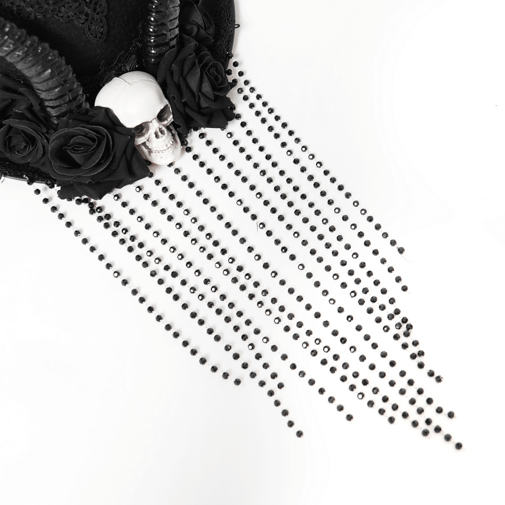 Gothic black horned top hat adorned with a skull, black roses, and cascading bead chains for a dramatic look.