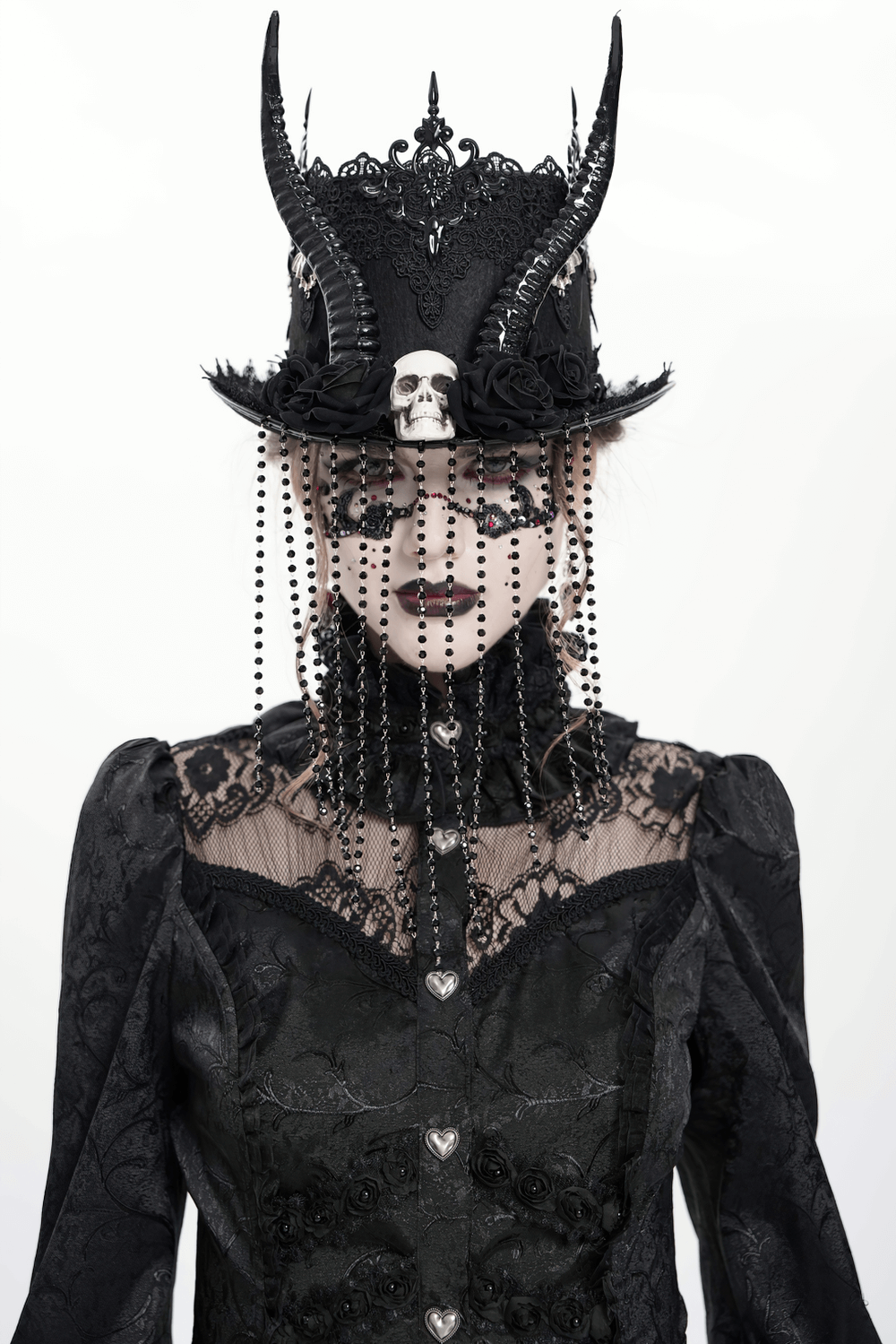 Gothic black horned top hat with skull, beads, and lace, perfect for dramatic dark fashion.
