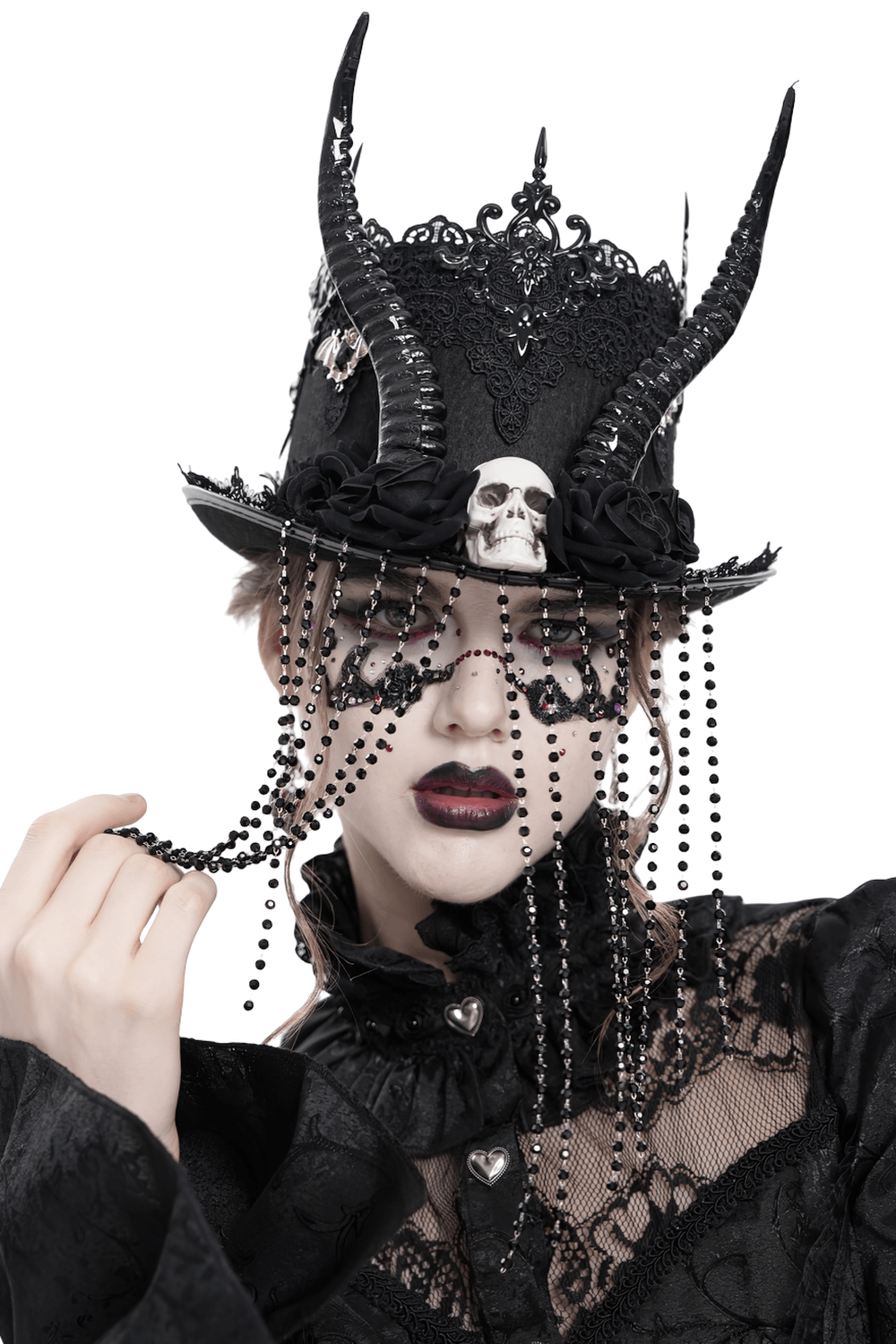 Gothic black horned top hat adorned with skull, roses, bead chains, and lace for dark fashion elegance.