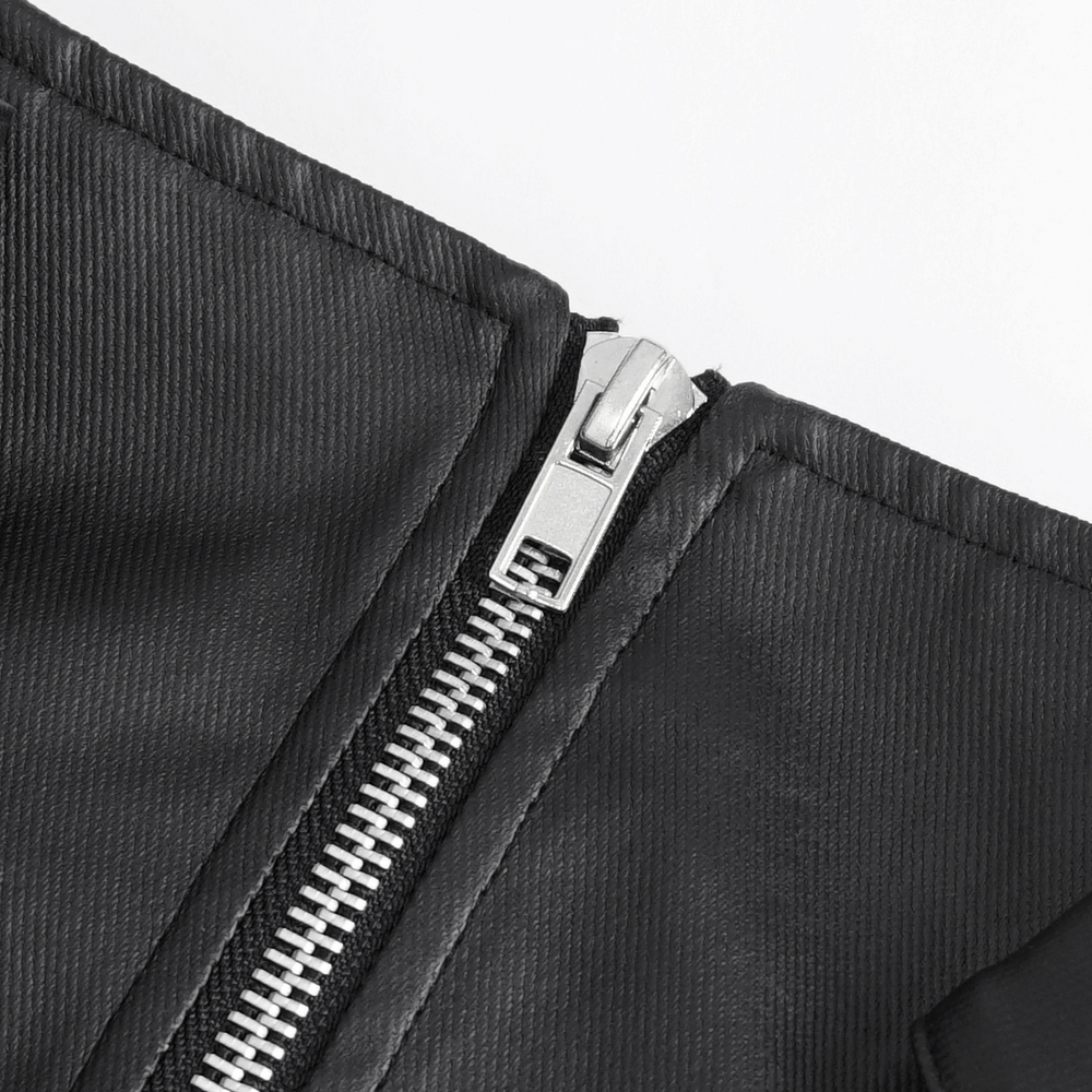 Close-up of a stylish black zipper detail on fabric, showcasing durability and sleek design for alternative fashion.