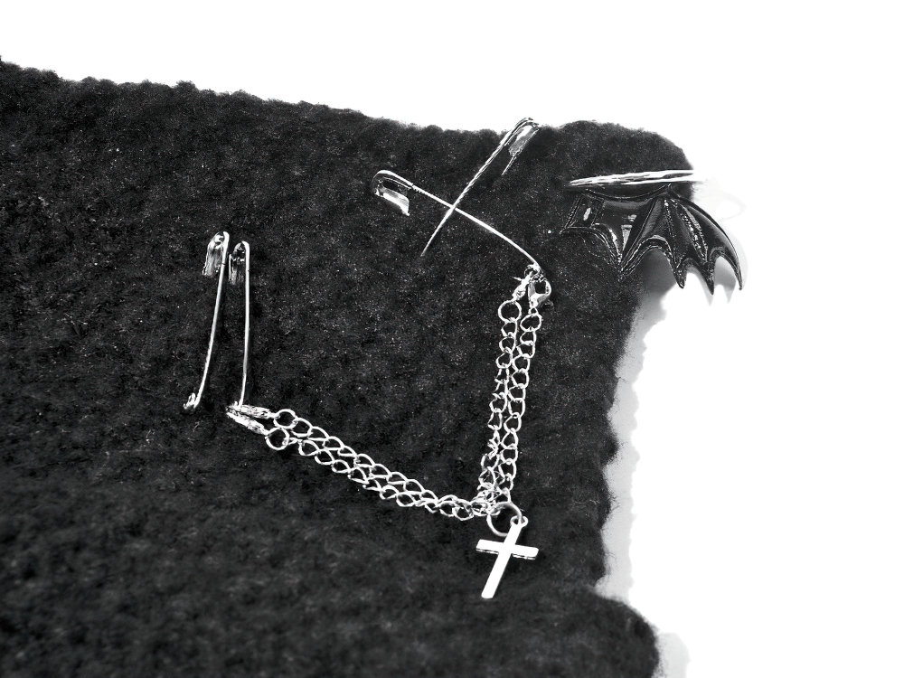 Gothic Black Knit Beanie Hat with Chains Pins and Bats featuring safety pins, chains, and bat charms for an edgy look.