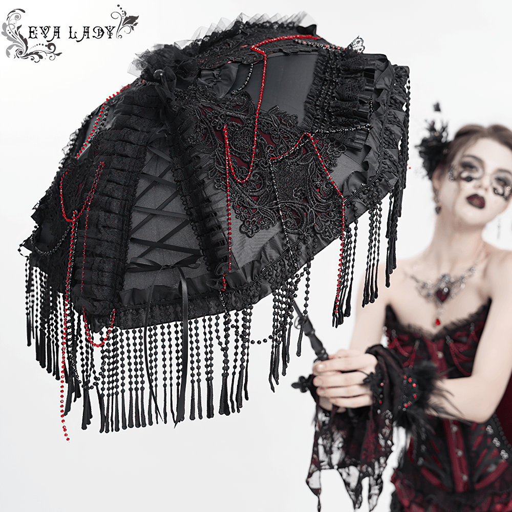 Gothic black lace umbrella with red bead accents and fringe, perfect for vintage-inspired fashion.