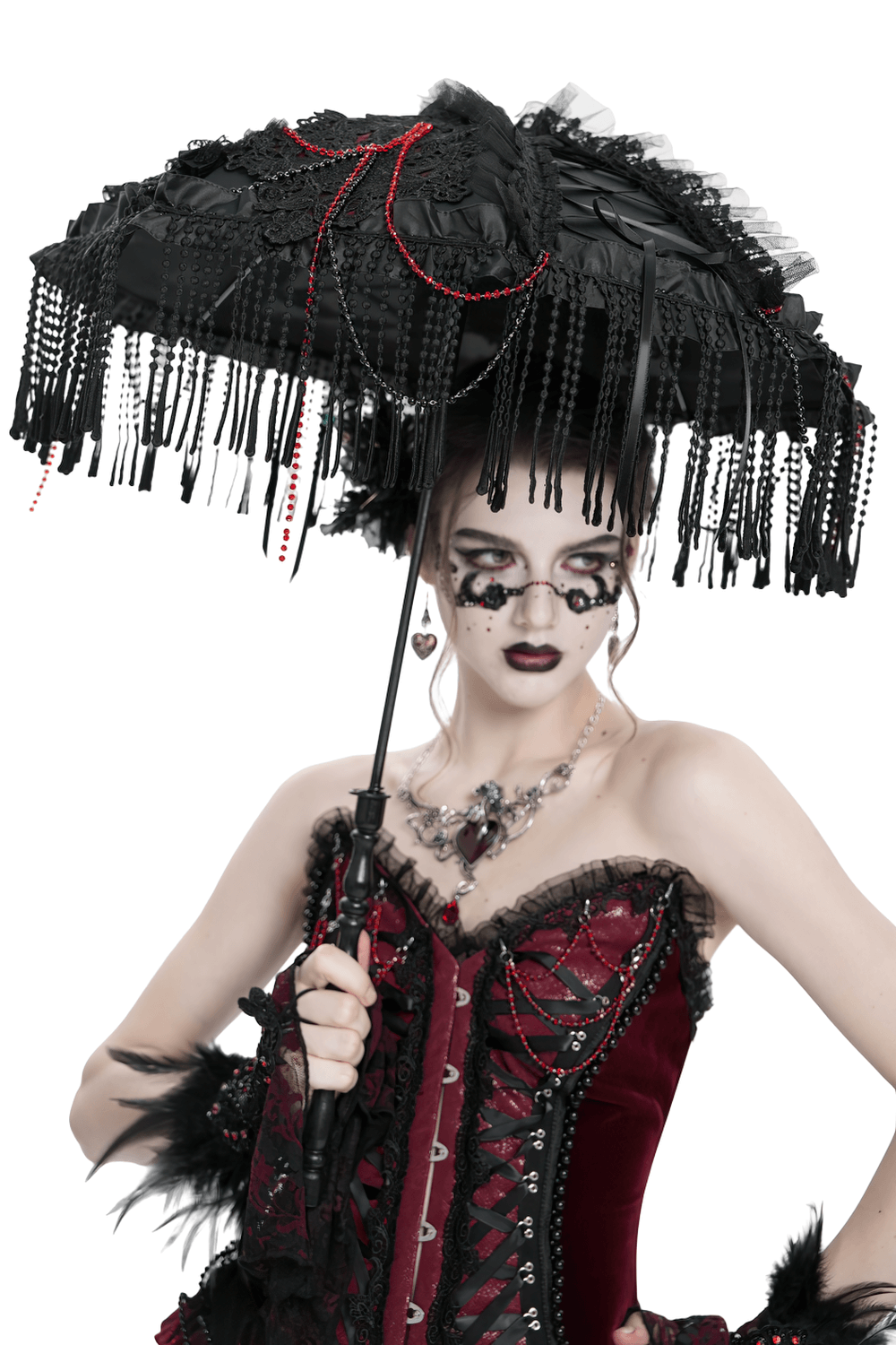 Gothic black lace and bead fringe umbrella with red details, held by model in vintage style attire.