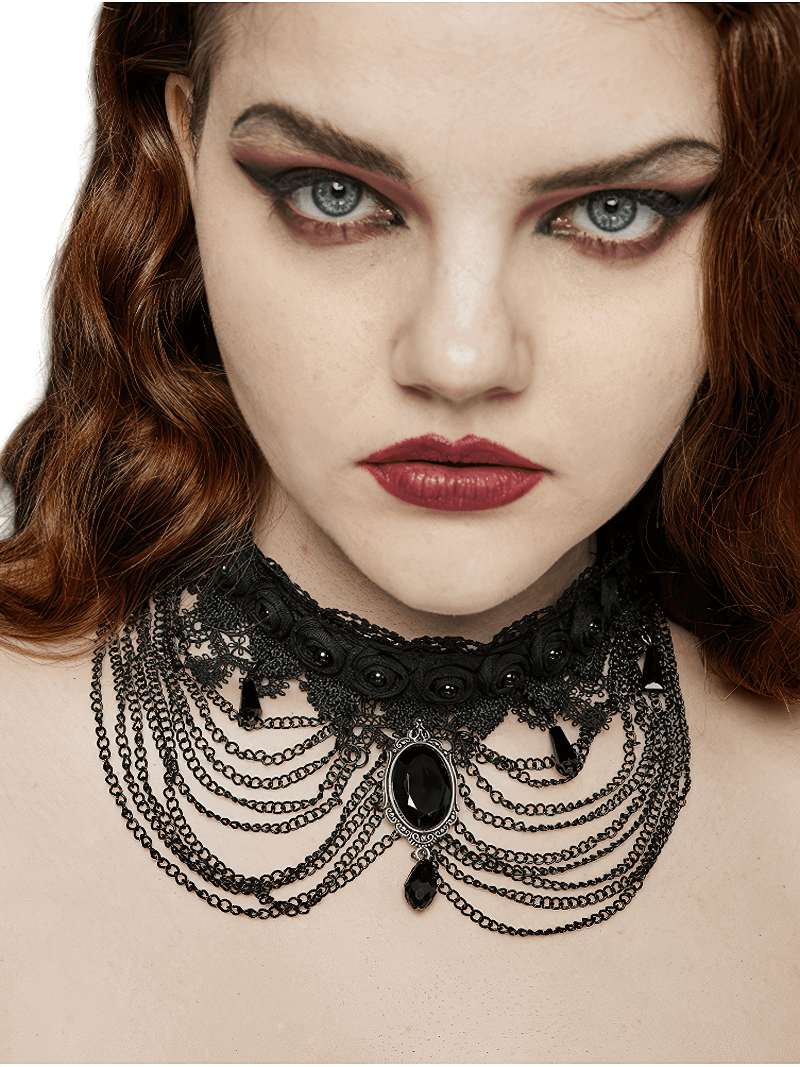 Gothic black lace and chain collar choker adorned with a gemstone pendant, perfect for bold fashion statements.